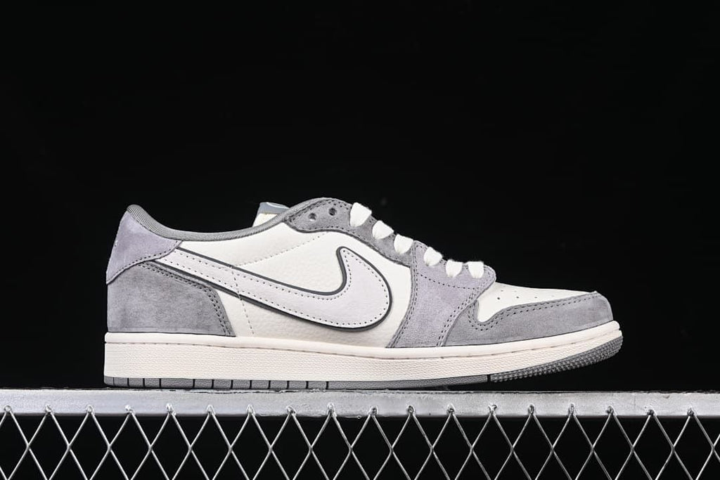 Side profile of a white and gray low-top sneaker
