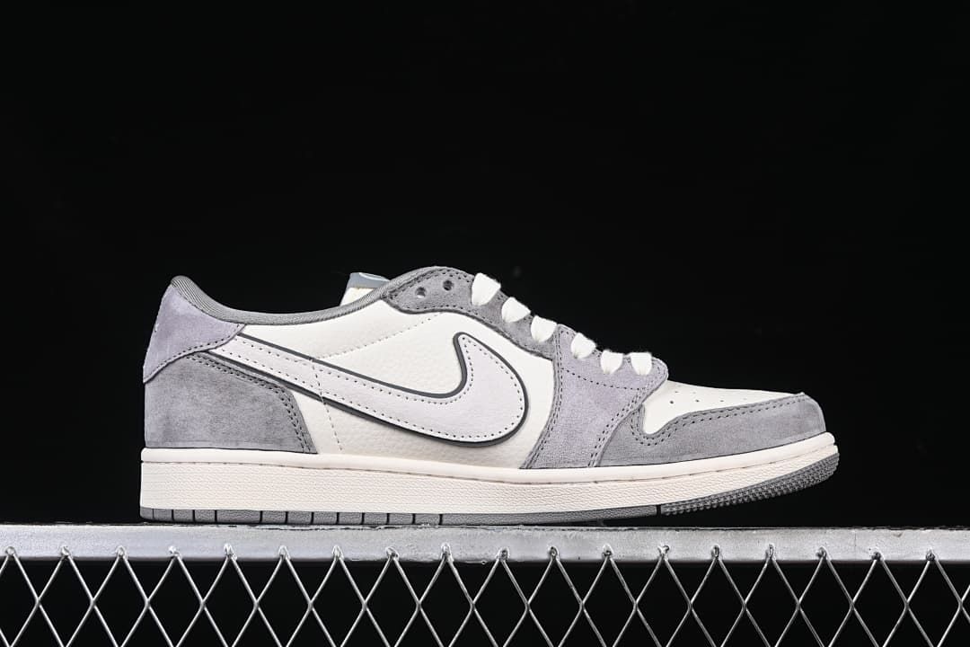 Side profile of a white and gray low-top sneaker