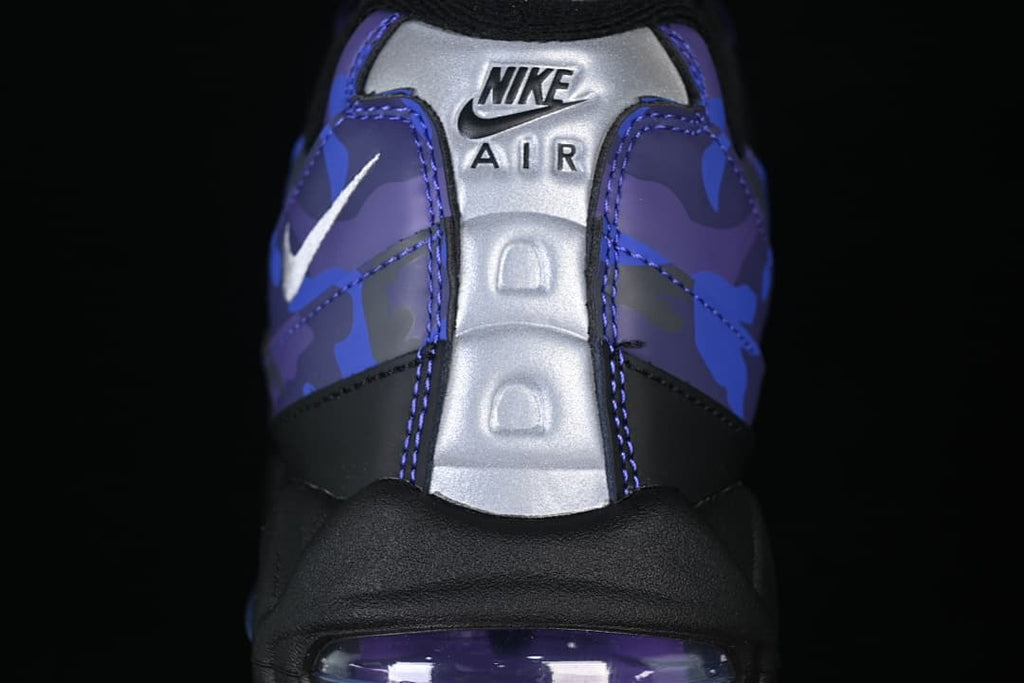 Close-up of the silver heel panel and blue-purple camouflage detailing