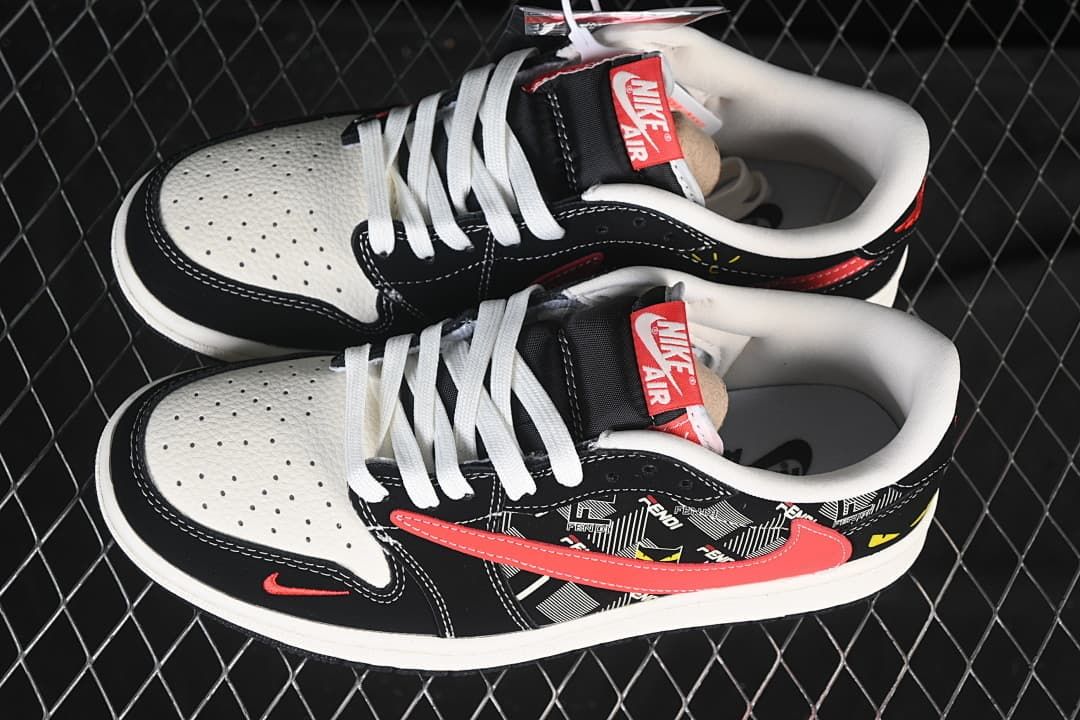 Overhead view of a pair of black, white, and red low-top sneakers with white laces, perforated toe boxes, and patterned side panels.