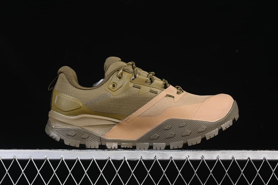 Opposite side view of the olive-green and tan hiking shoe