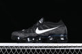 Side view of a black Nike Air Vapormax 2023 Flyknit with white Swoosh and visible air-cushioned sole