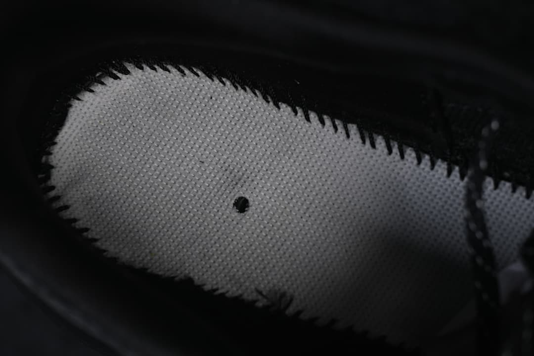 Close-up of the shoe's perforated inner lining
