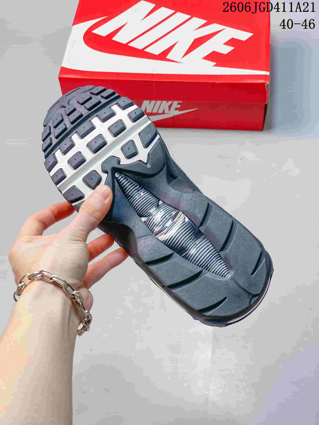 Outsole view of a grey Nike Air Max 95 sneaker