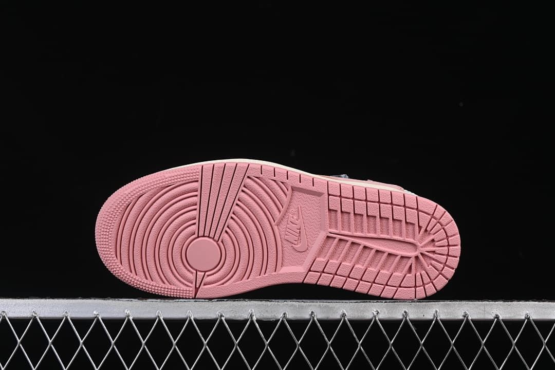Underside view showing the pink outsole tread.