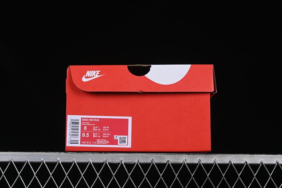 Red Nike shoe box with a visible V2K Run product label