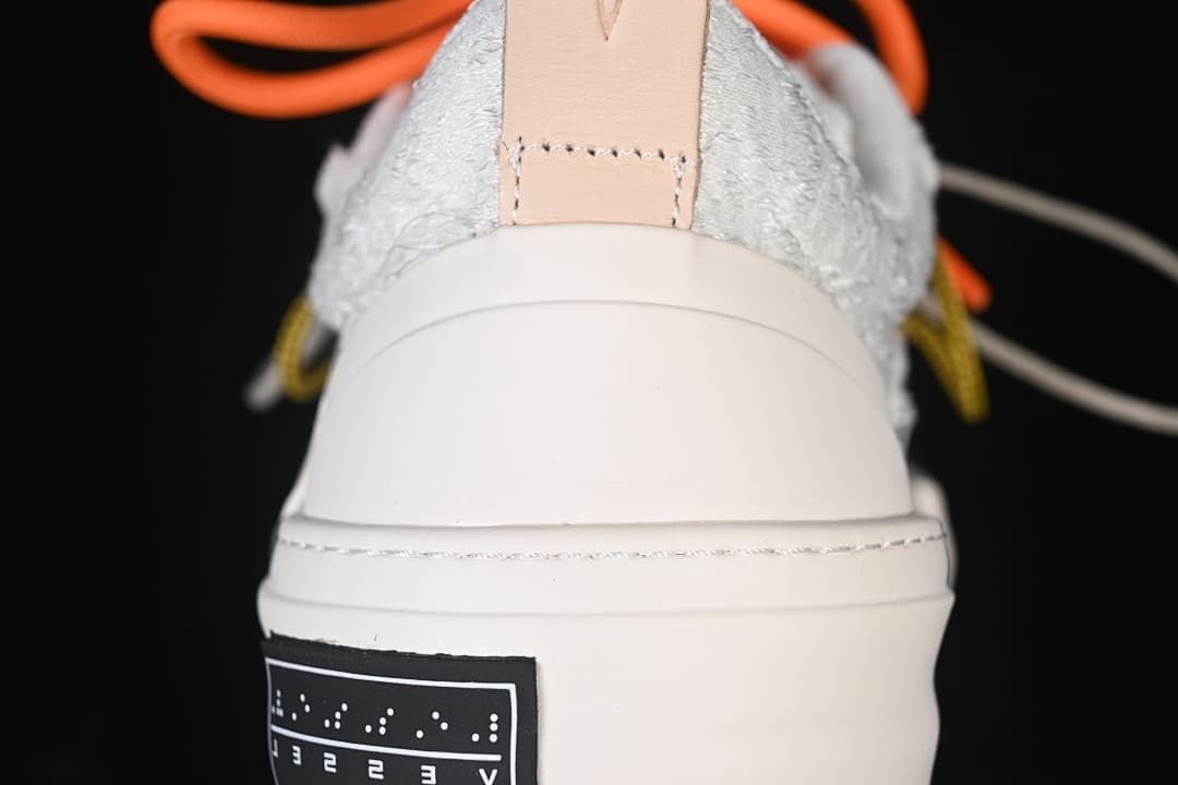 Rear view of the sneaker showing the heel tab and thick platform sole.
