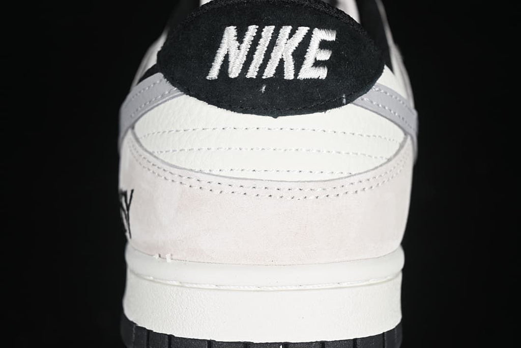 Rear view showing the black heel tab and white midsole