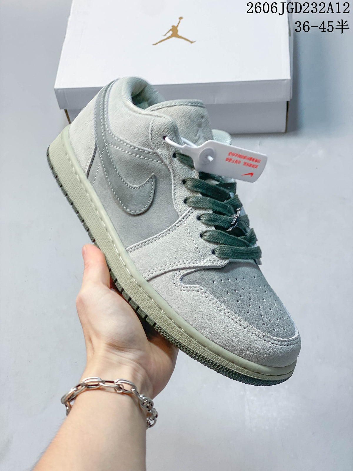 Angled close-up of the sneaker's side, toe, and laces