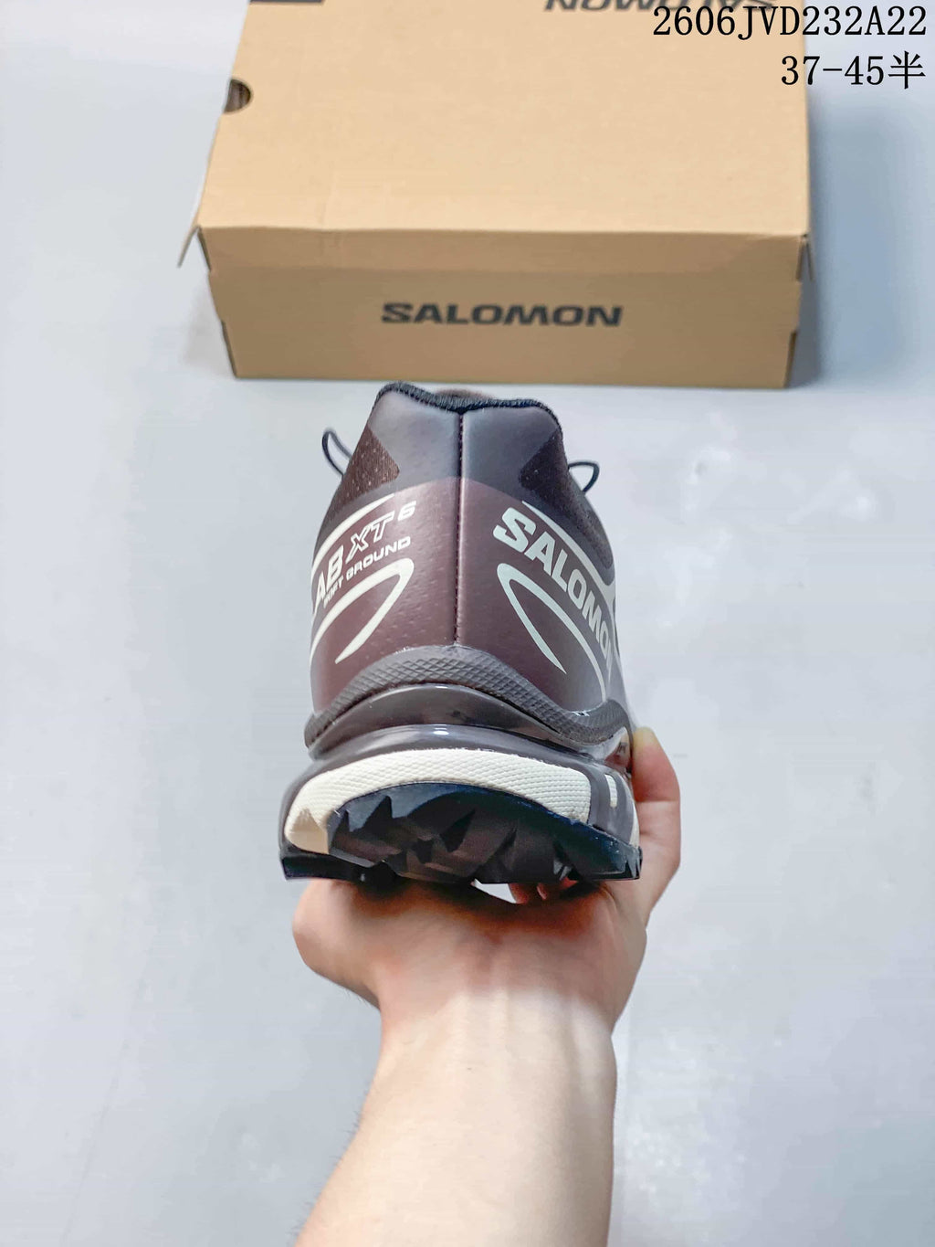 Rear view of the Salomon XT-6 shoe showing heel details and outsole.