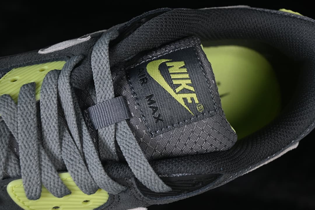 Close-up of the tongue branding and grey laces.