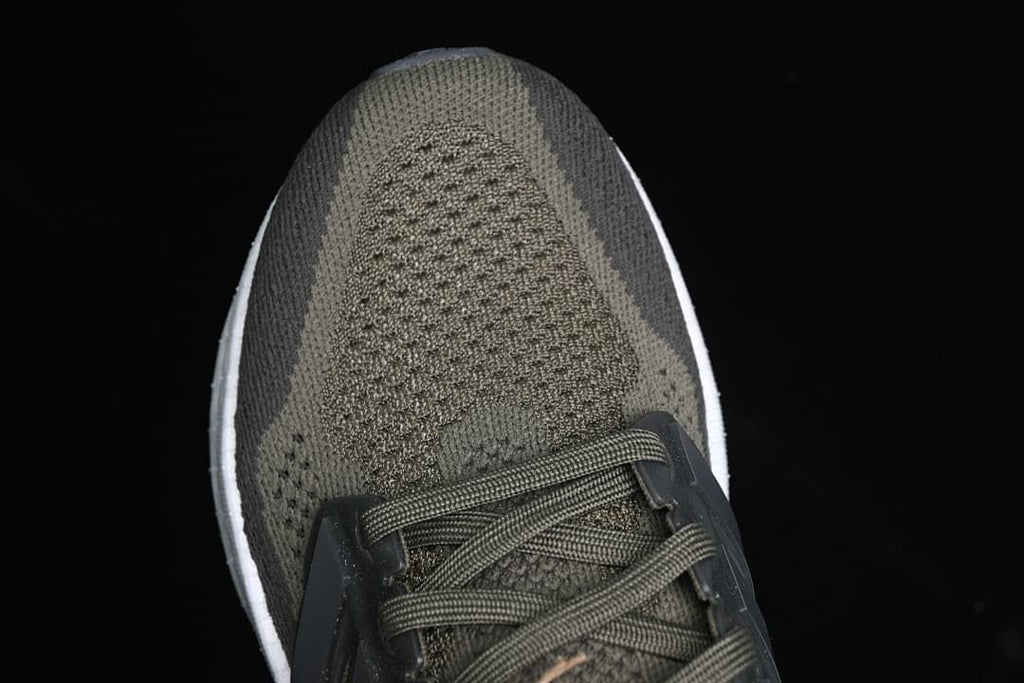 Top-down close-up of the knit-patterned toe and lacing