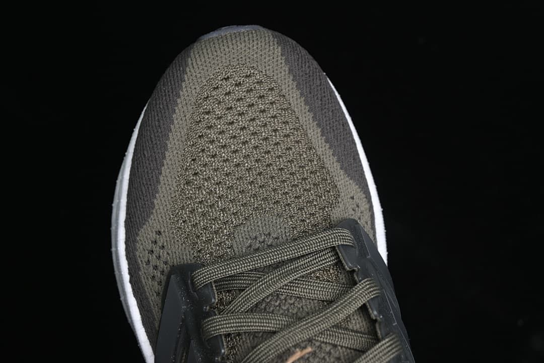 Top-down close-up of the knit-patterned toe and lacing