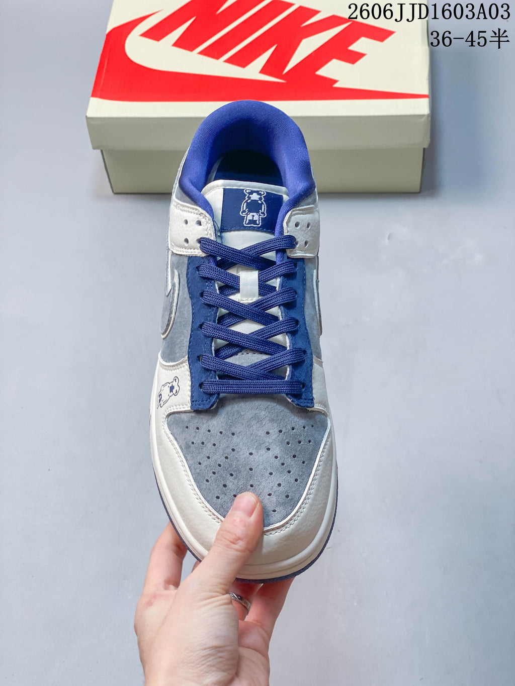Top view showing the perforated toe, blue laces, and padded collar