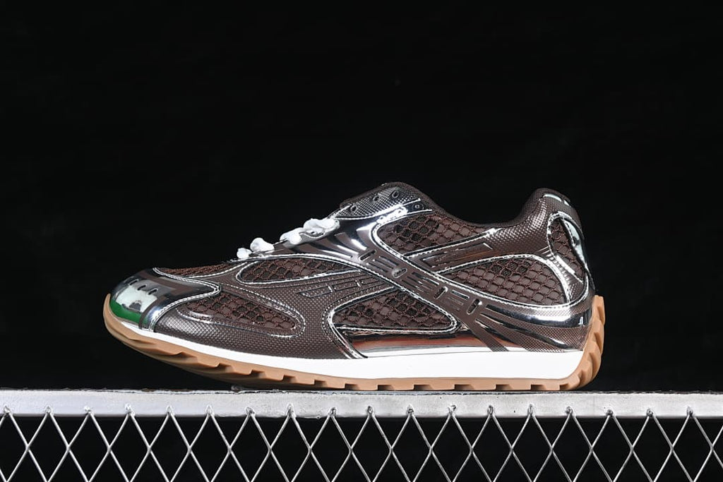 Side view of a brown and silver-tone Bottega Veneta Orbit sneaker with white laces and a tan outsole.
