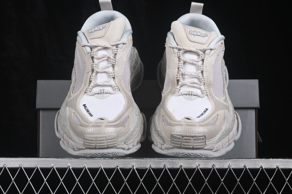 Front view of the pair showing the rounded toes, lace-up fronts and Triple S 2 tongue branding.