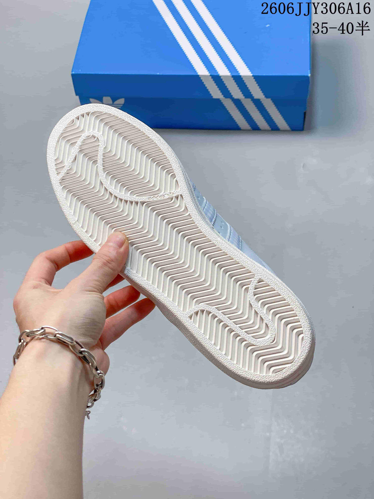 Underside of the sneaker showing a patterned outsole