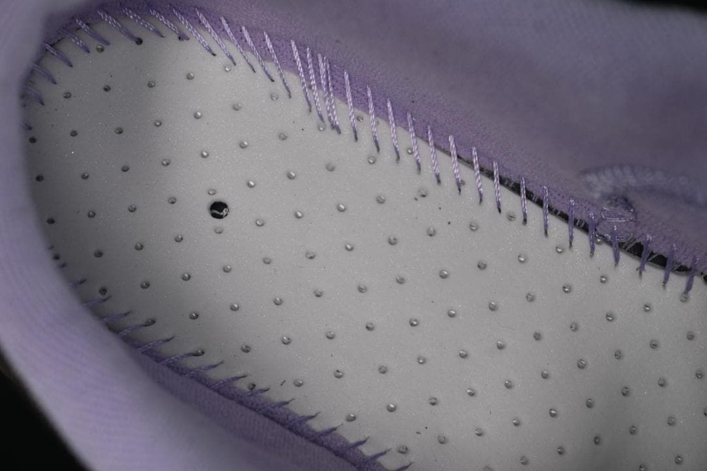 Close-up of the shoe interior and textured insole