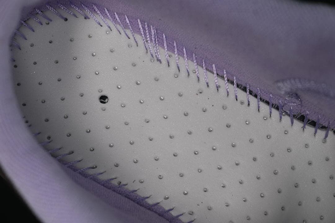 Close-up of the shoe interior and textured insole
