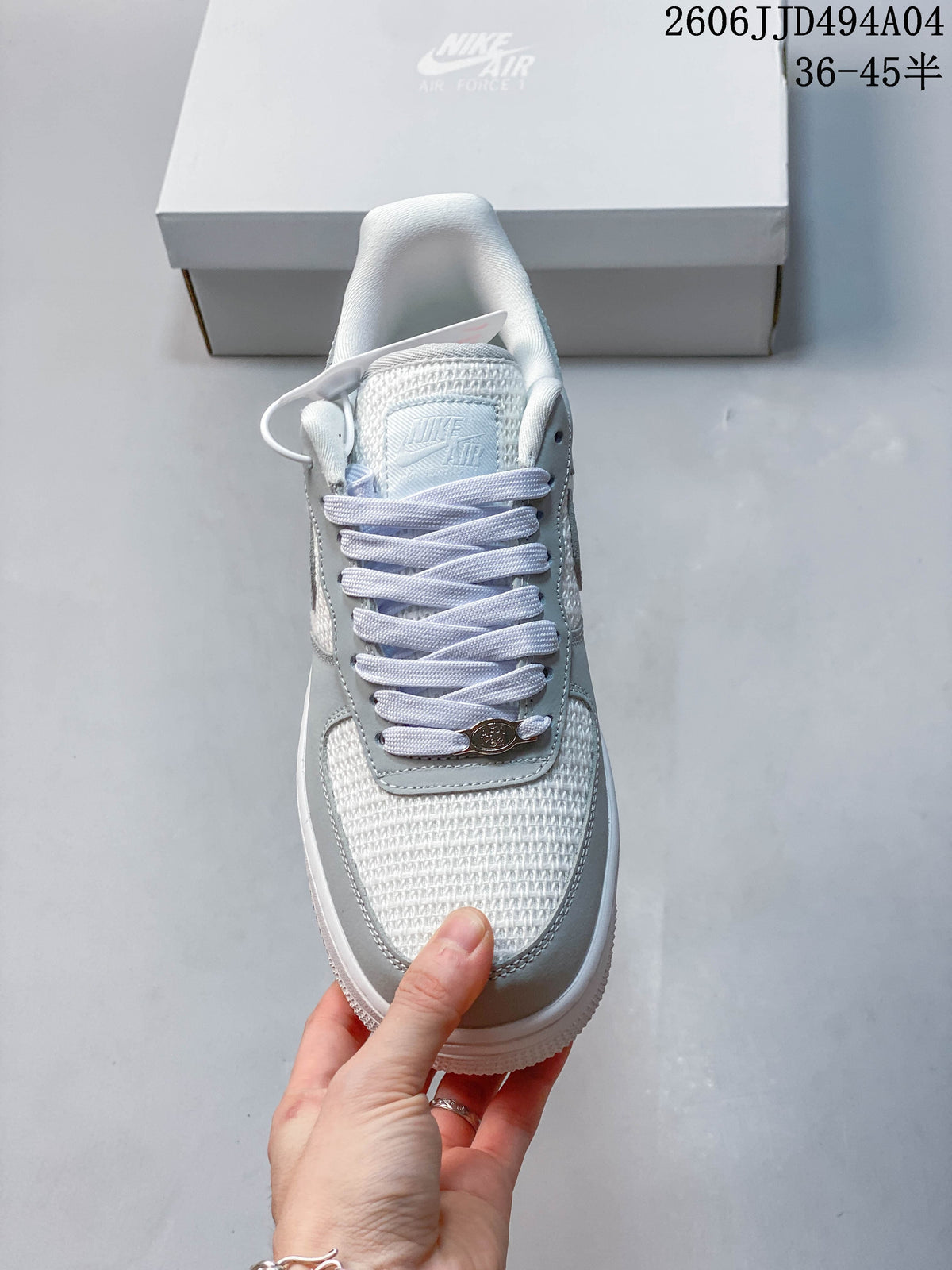 Front view showing the laces, tongue, and textured toe panel