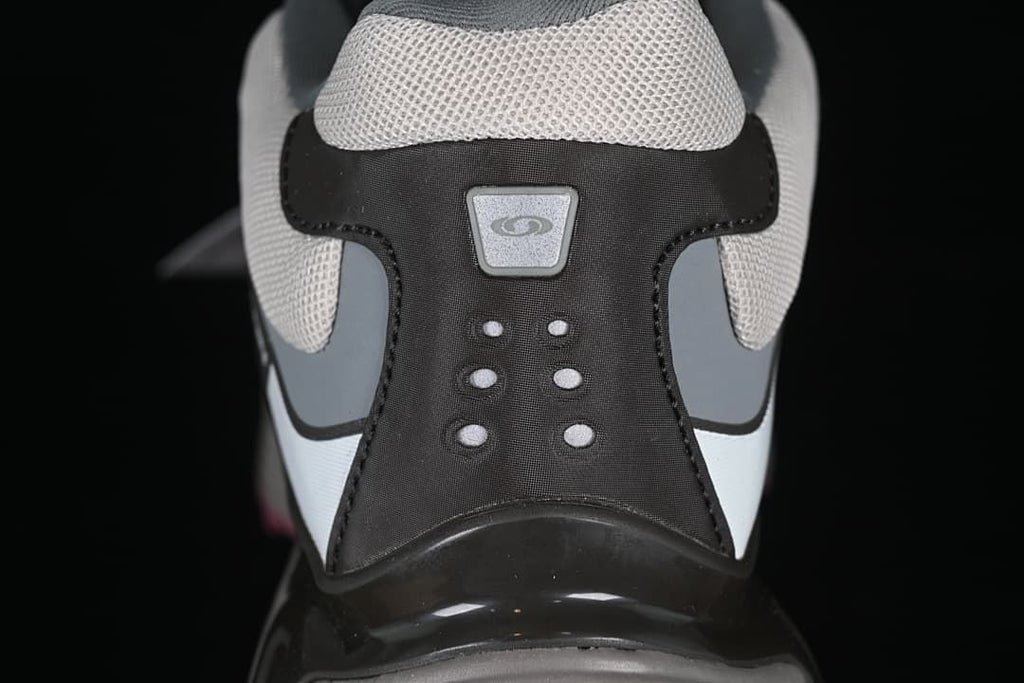 Rear detail of the shoe with a padded collar and layered heel panels.