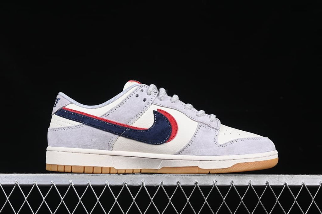 Side profile showing the low-top silhouette and layered Swoosh detail.