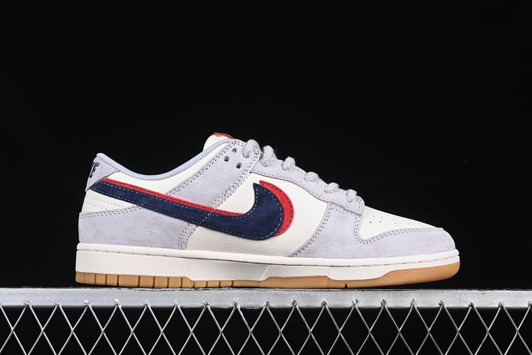 Side profile showing the low-top silhouette and layered Swoosh detail.