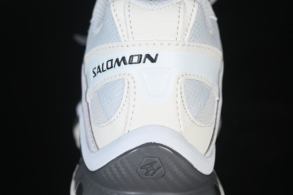Rear view showing Salomon branding and grey heel section