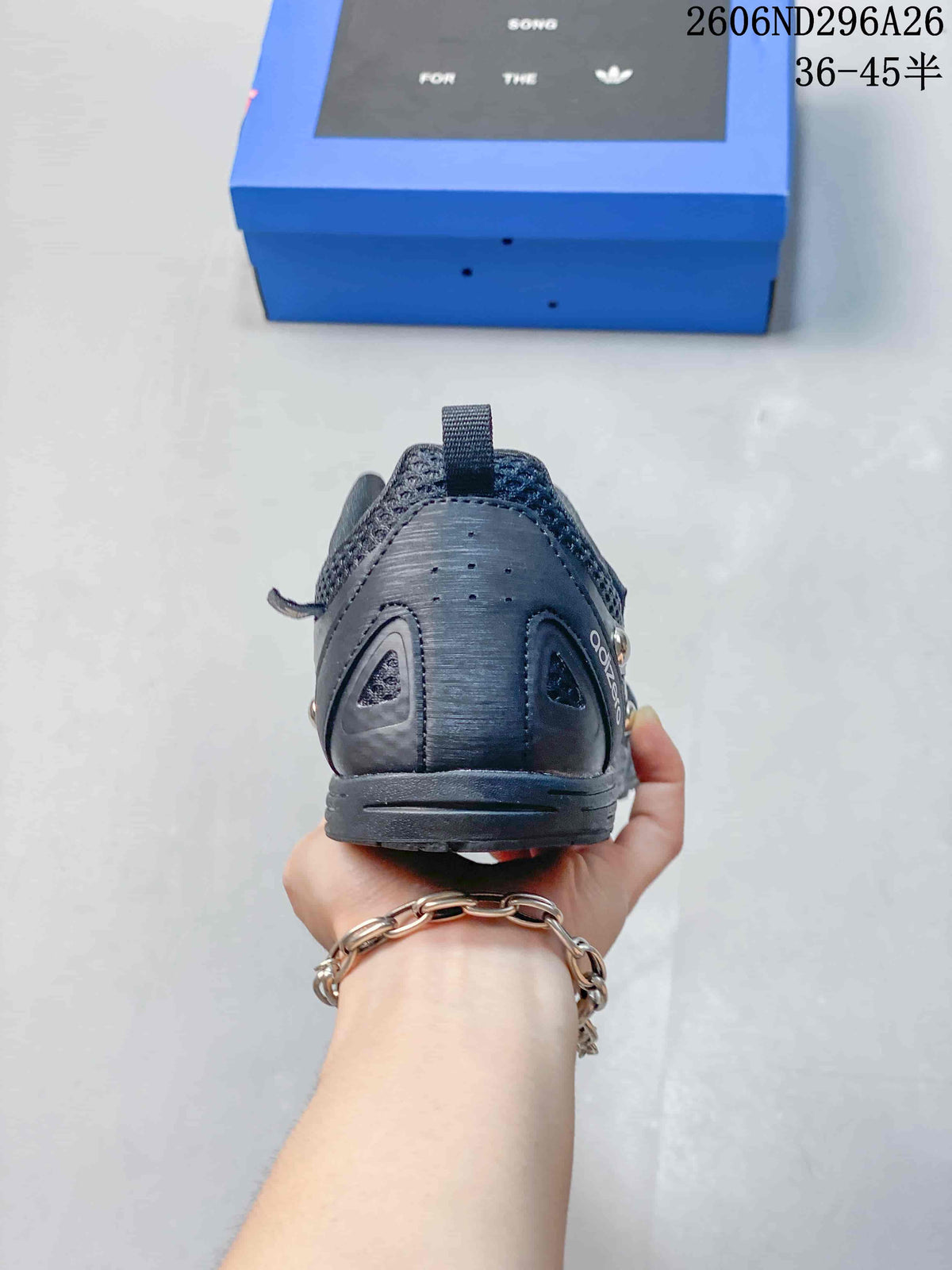 Rear view of a dark gray sneaker with a heel pull tab