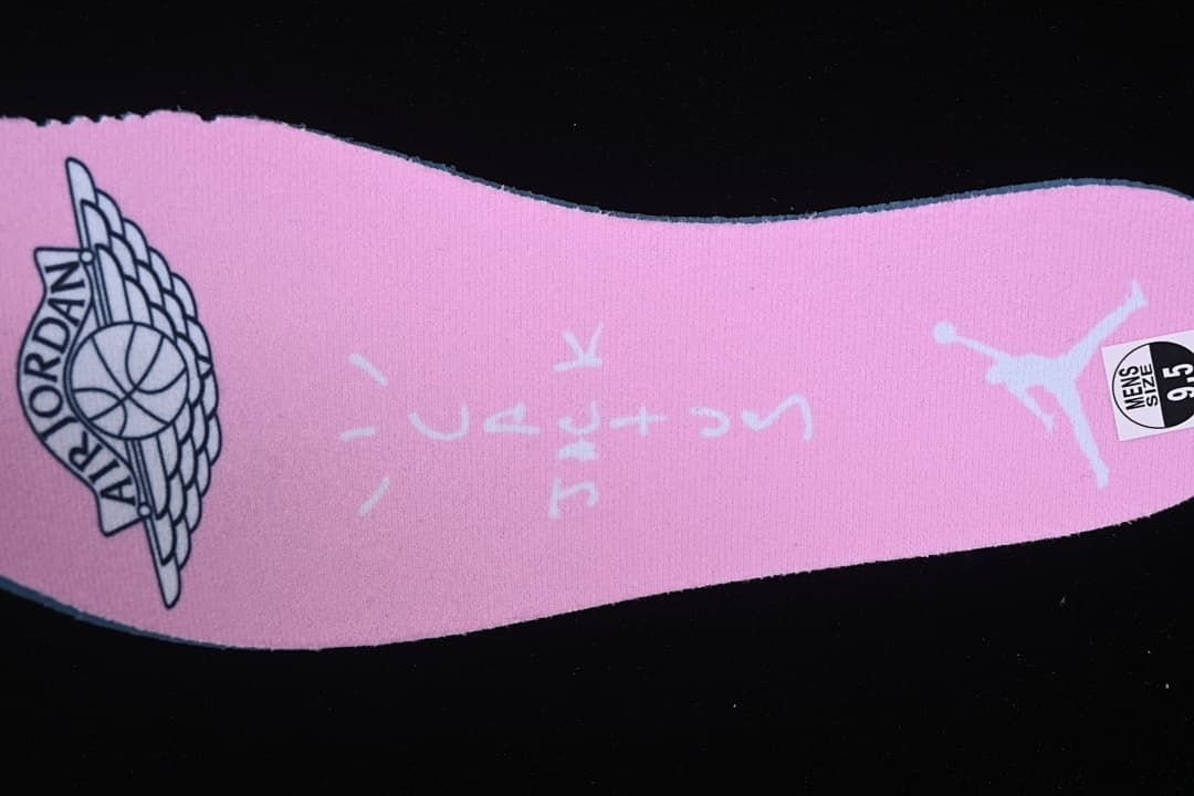 Pink insole with Jordan branding and a visible size sticker