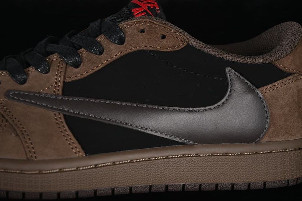 Close-up of the oversized dark side Swoosh and brown overlays