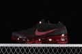 Nike Air VaporMax 2023 Flyknit sneaker in black and dark red, side view