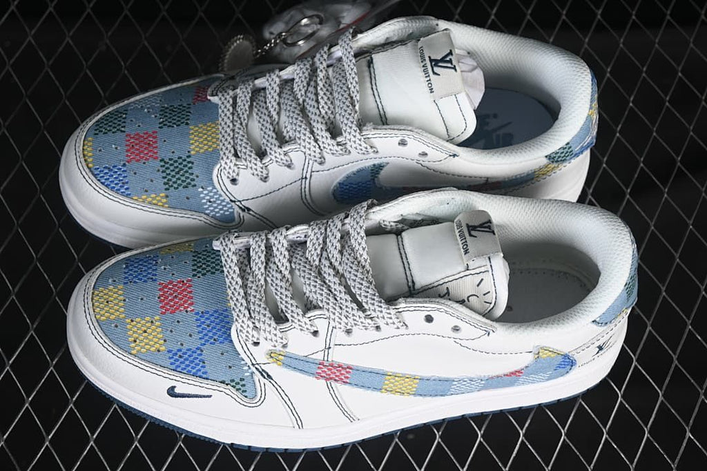 Top and side view of a pair of white low-top sneakers with blue multicolor patterned panels, contrast stitching, and patterned laces.