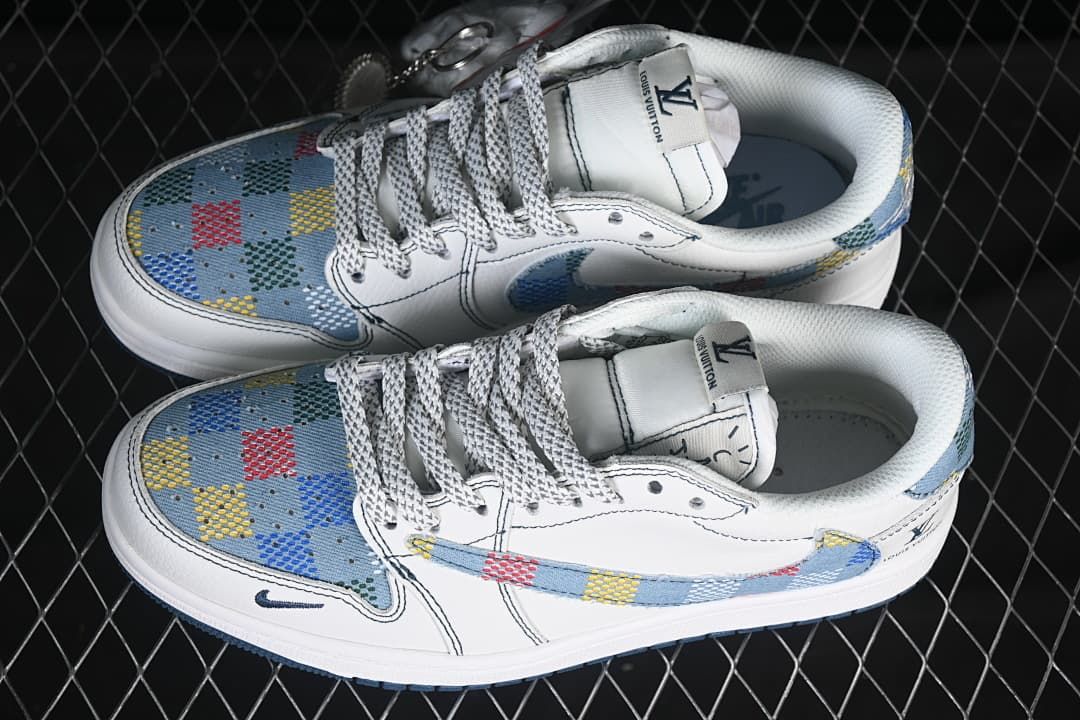 Top and side view of a pair of white low-top sneakers with blue multicolor patterned panels, contrast stitching, and patterned laces.