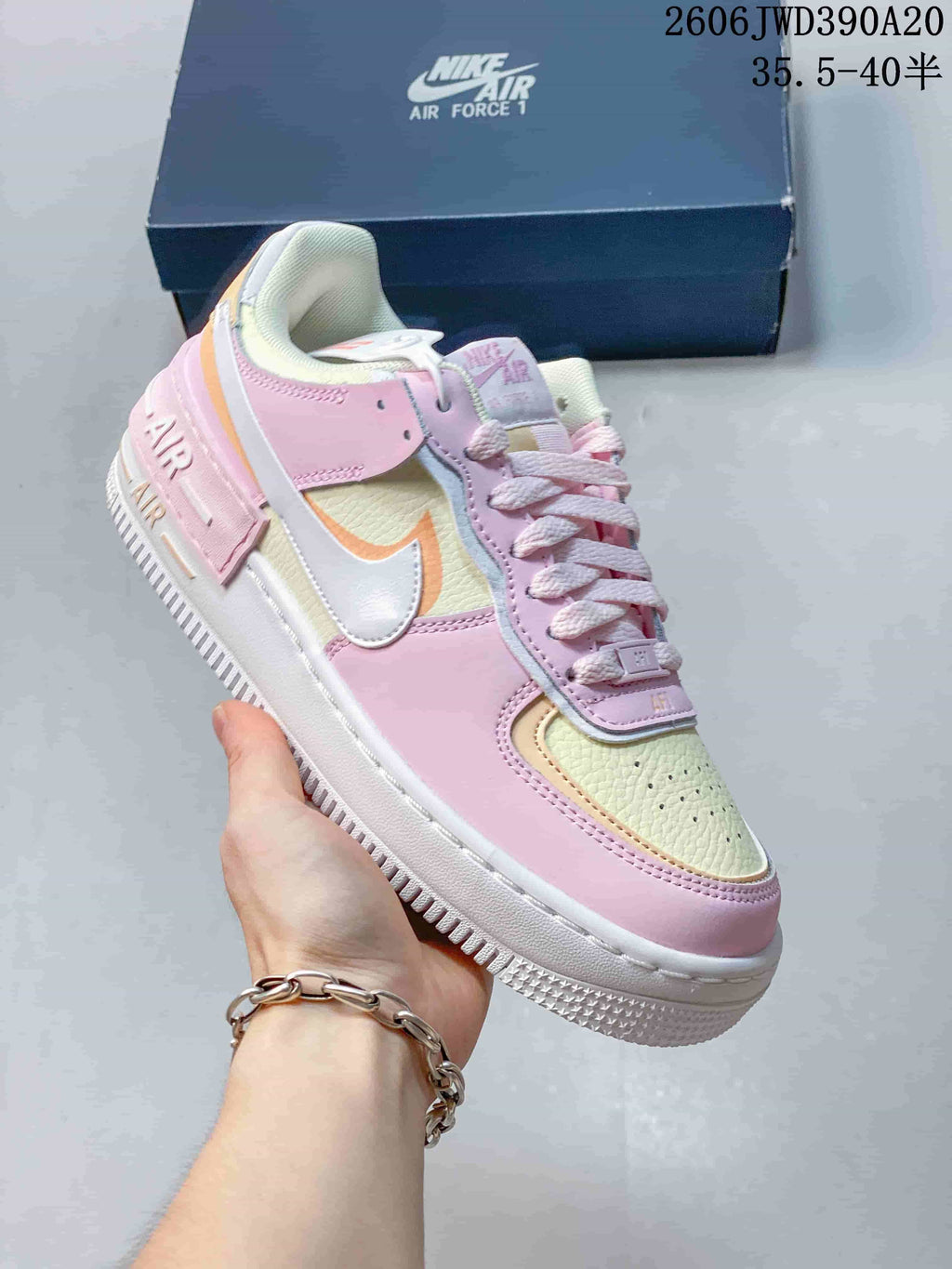 Angled side view of the pastel Nike Air Force 1 low-top sneaker with a white Swoosh.