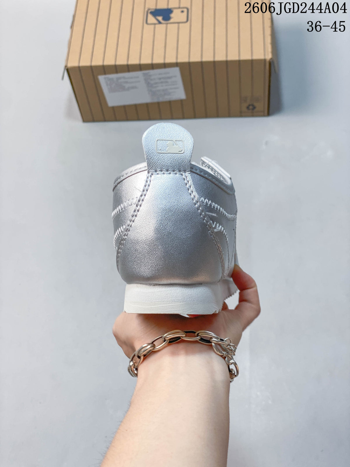 Rear view showing the silver heel and white outsole