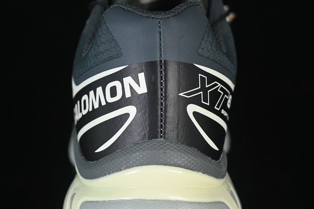 Close-up of the Salomon XT-6 GTX heel with white graphics.