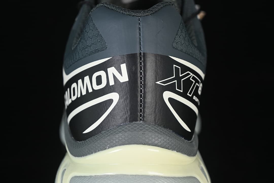 Close-up of the Salomon XT-6 GTX heel with white graphics.