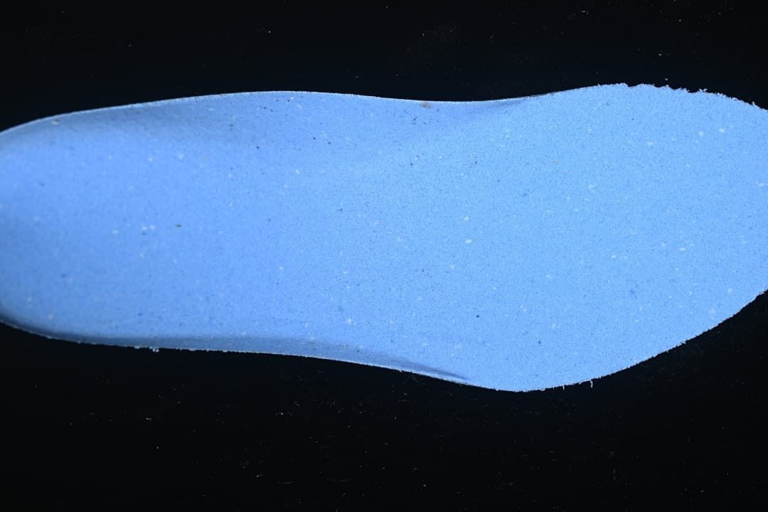 Blue footbed shown separately against a dark background