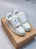 Pair of white low-top sneakers with colorful floral side embroidery and yellow accents, shown on a patterned box; image text lists sizes 36–46 and code 2606JWD124A04.