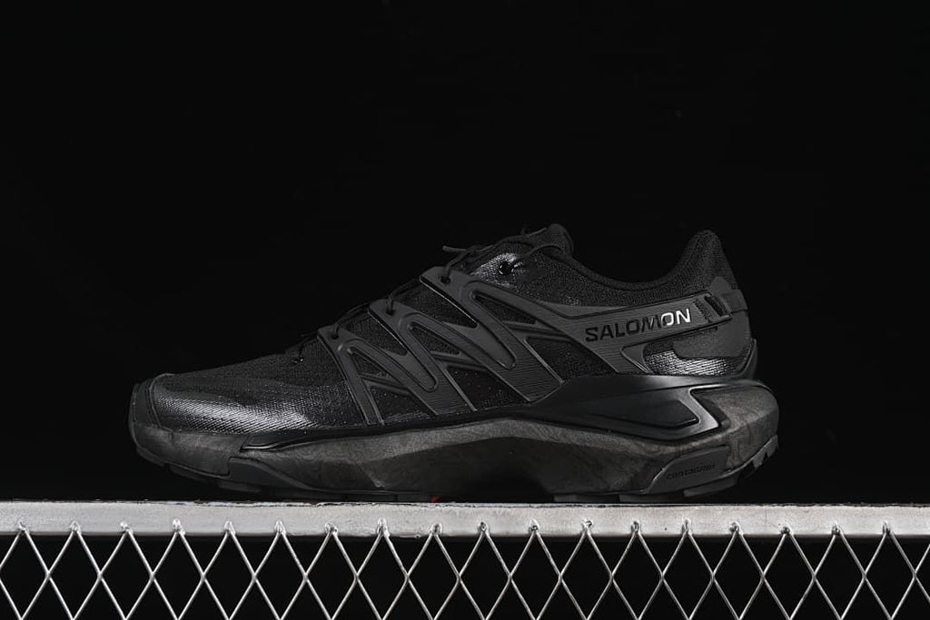 Side view of black Salomon XT Pu.re Advanced shoes