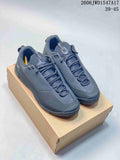 Pair of dark gray Arc'teryx Konseal low-top shoes, shown from above and at an angle.