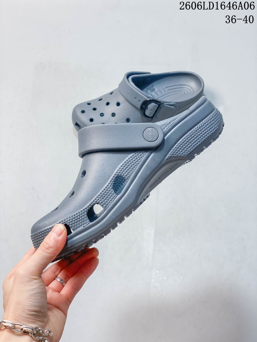 Side profile of a gray clog with ventilation openings and an adjustable heel strap; image also displays size range 36–40.