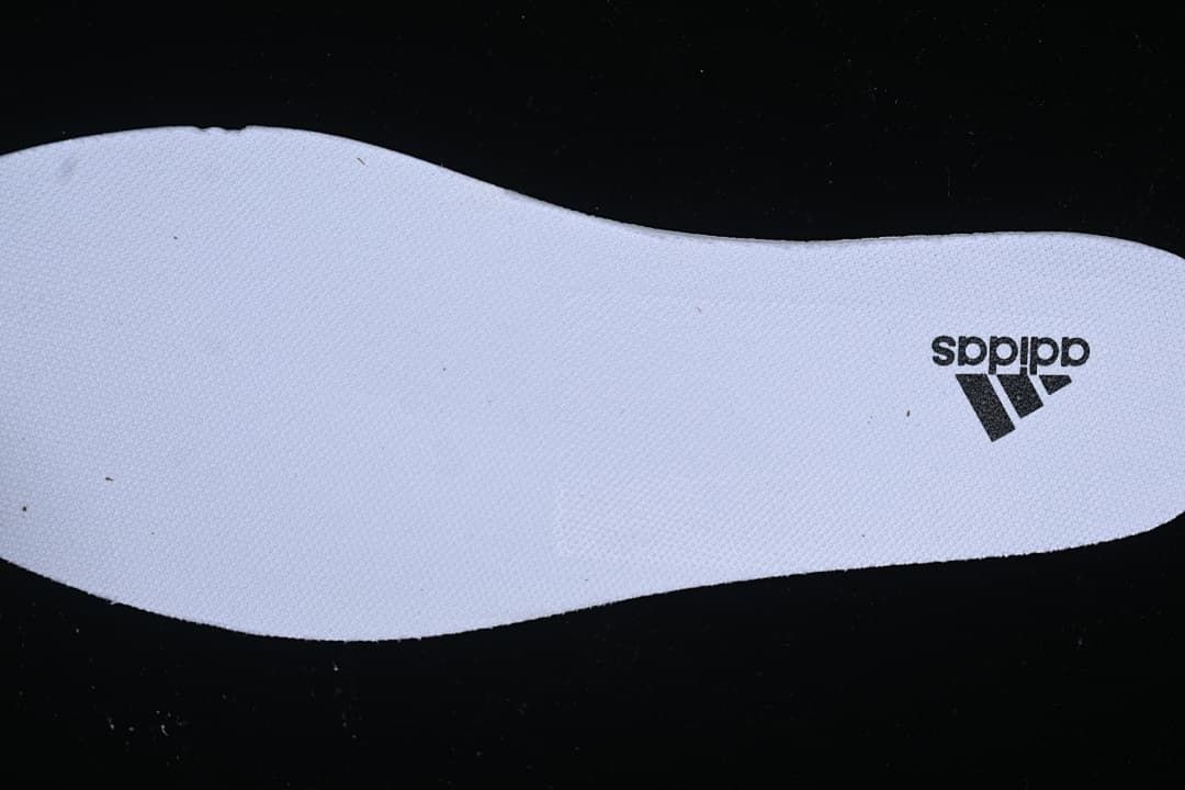 Close-up of the white insole with adidas branding
