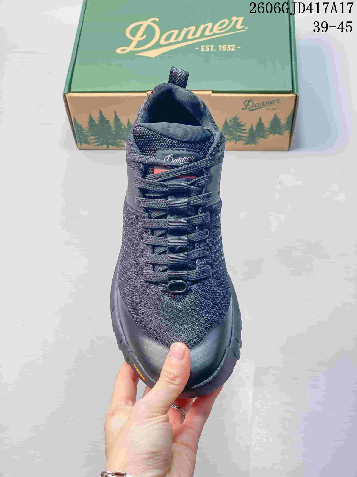 Front view of the dark gray shoe with laces and a reinforced toe area.