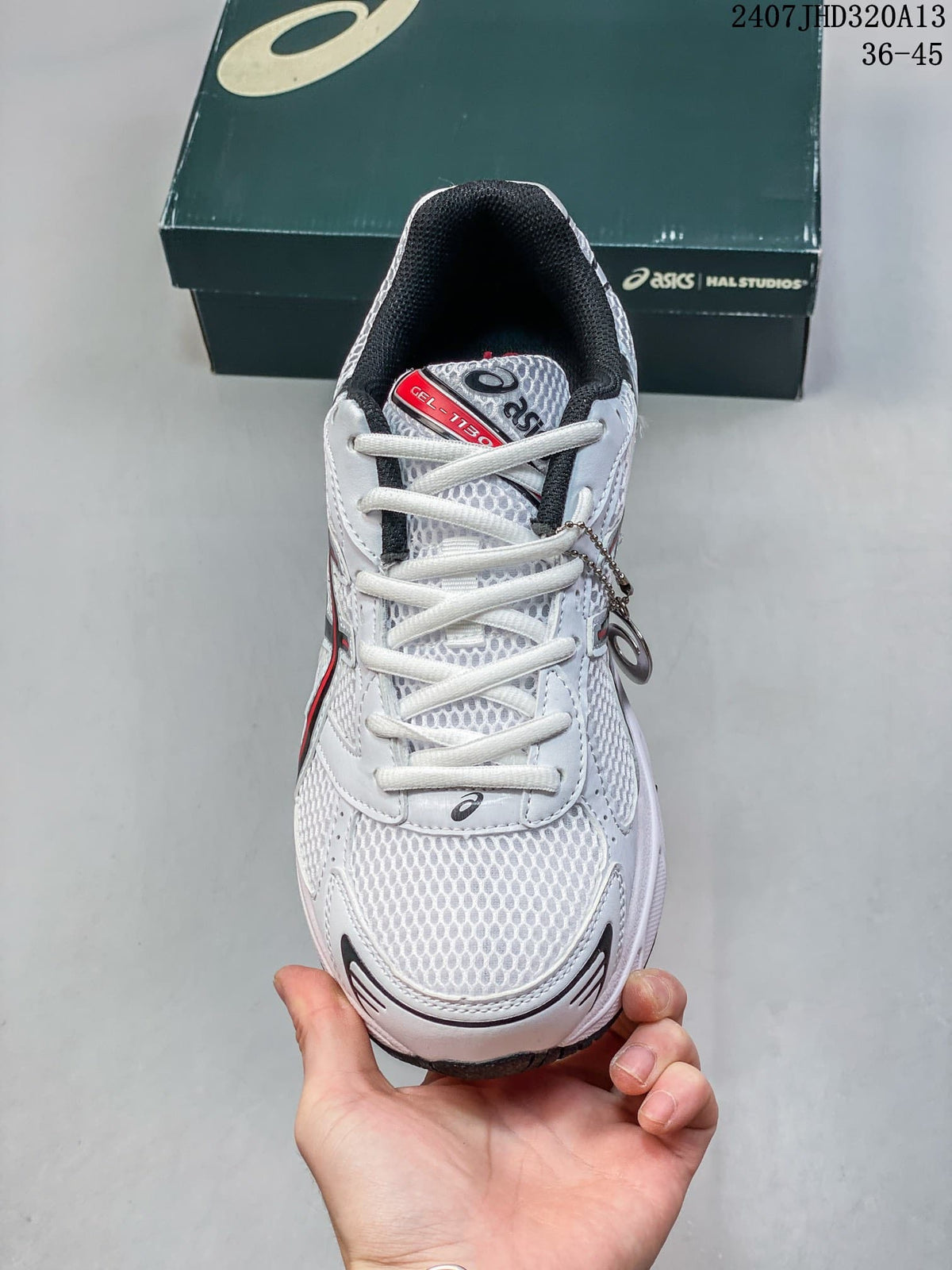 Top view of the sneaker showing its laces, tongue, and mesh-look upper