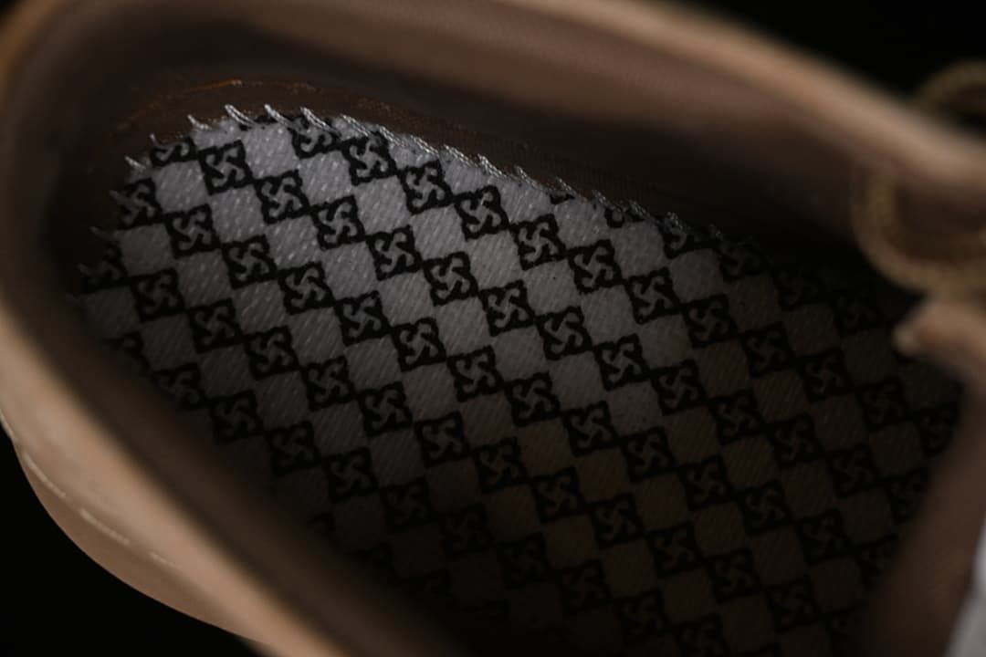 View inside the boot showing patterned lining