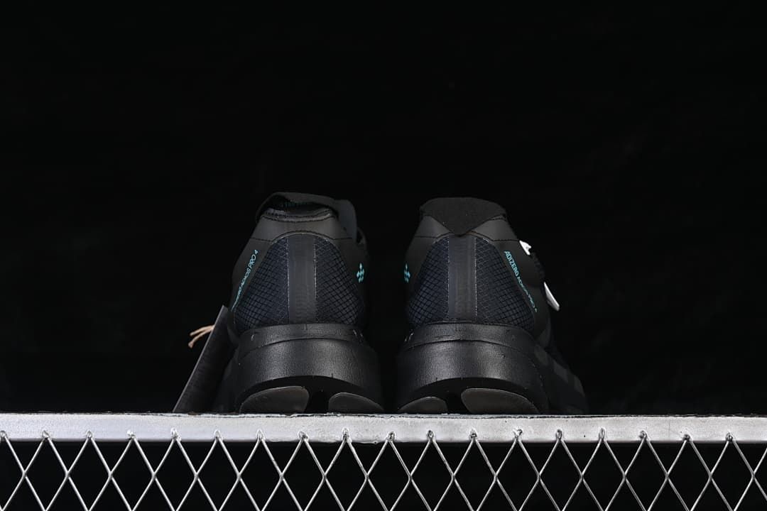 Rear view of the pair of black running shoes