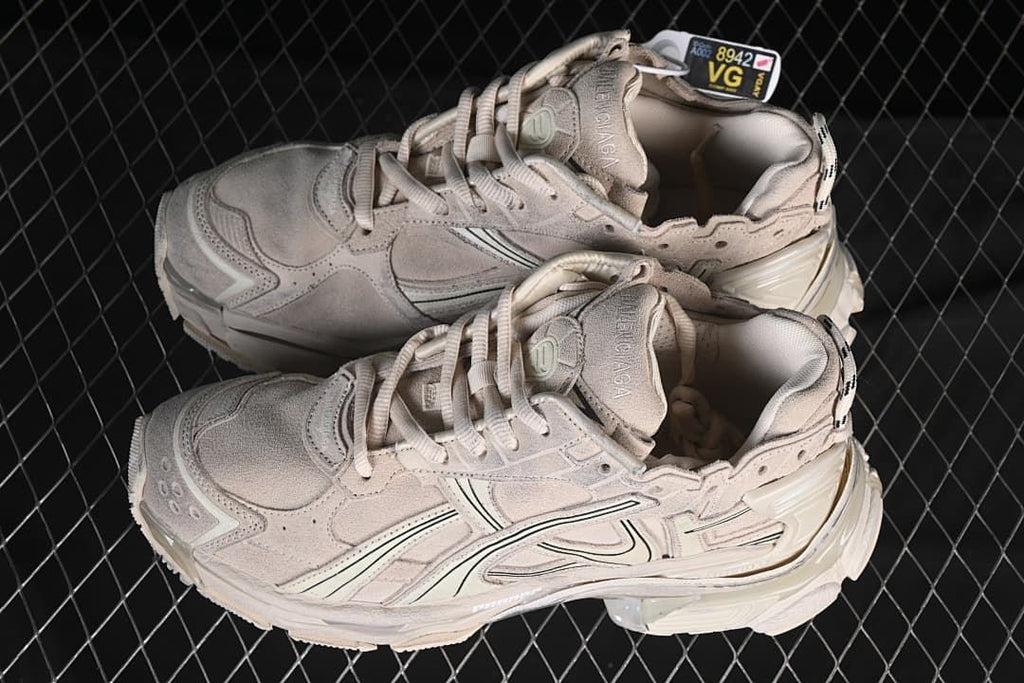 Pair of beige Runner sneakers shown from above at an angle