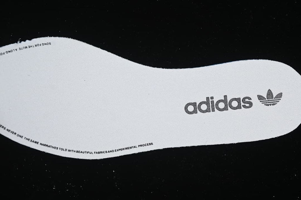 White insole with adidas Trefoil branding